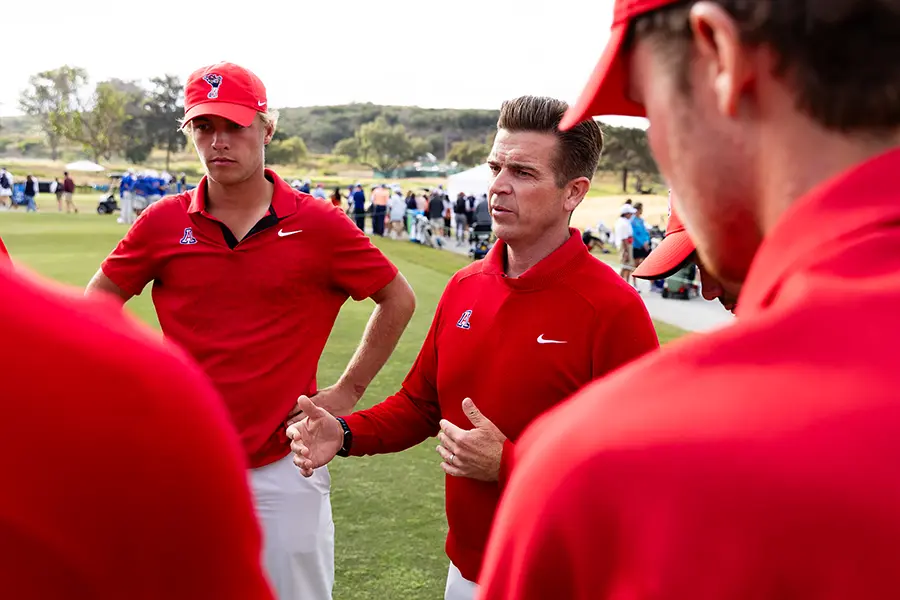 Coach Instructing Players